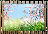 Wallario Garten-Poster Outdoor-Poster - Kirschblütenzweige und grüne Wiese- Frühling in Premiumqualität, Größe: 61 x 91,5 cm, für den Außeneinsatz geeignet